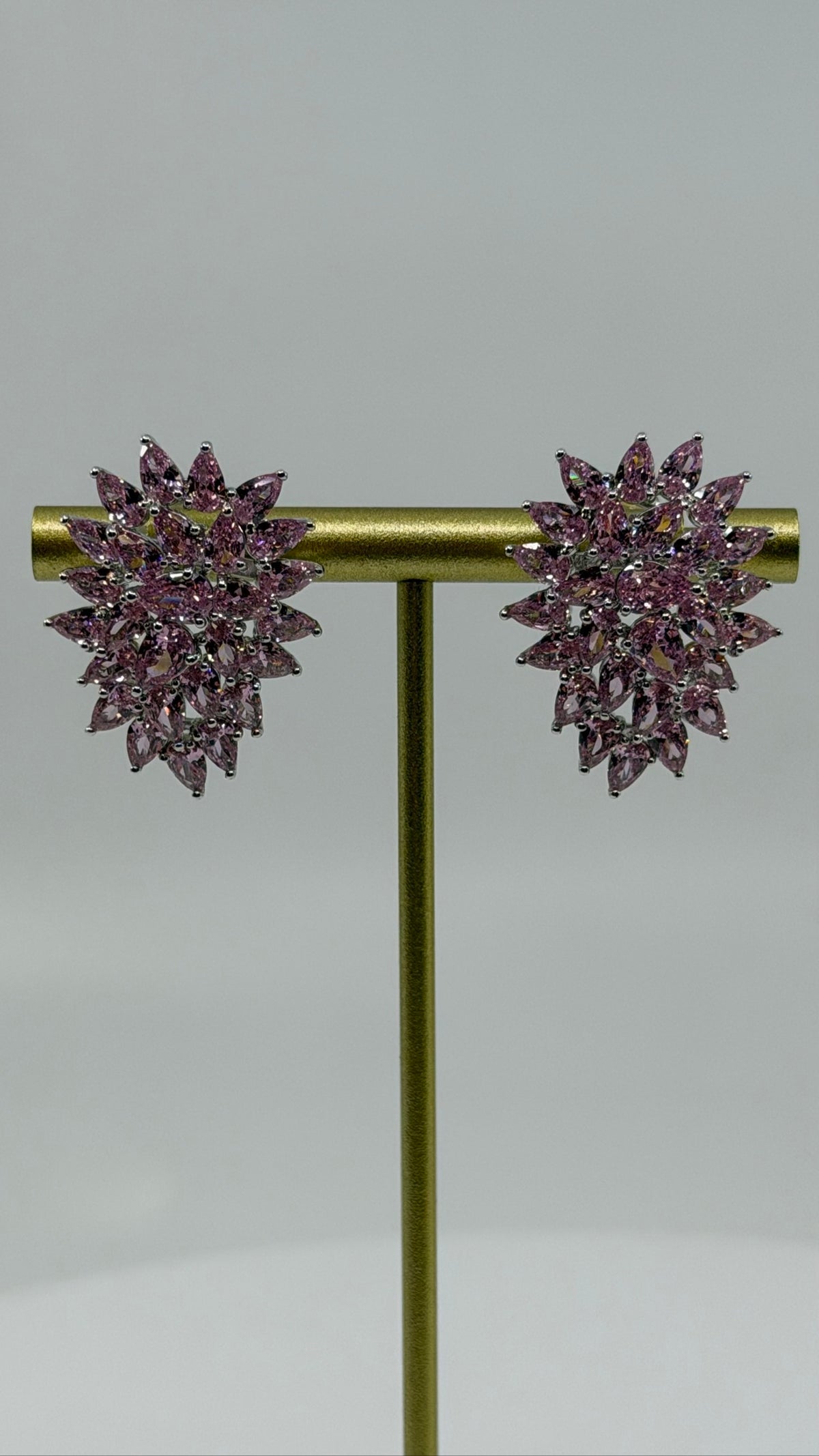 Pink Marquise Cluster Stud Earrings on a stand