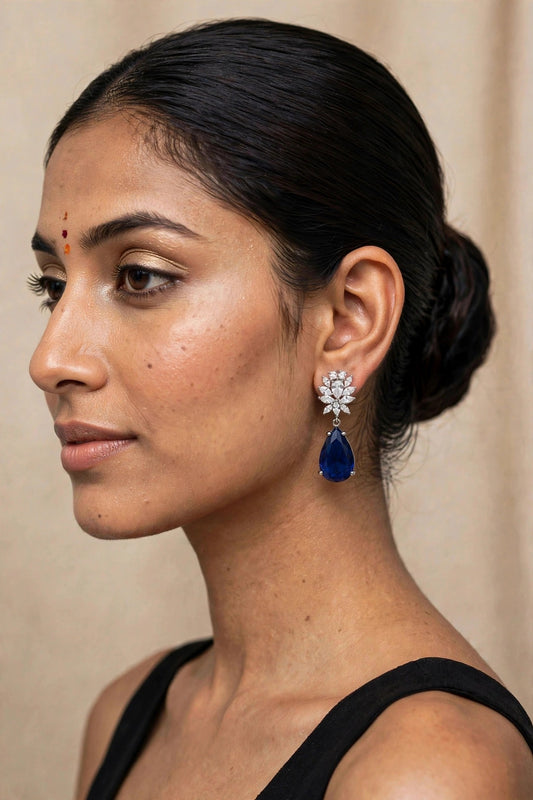 Model wearing Sapphire Bloom Teardrop Earrings