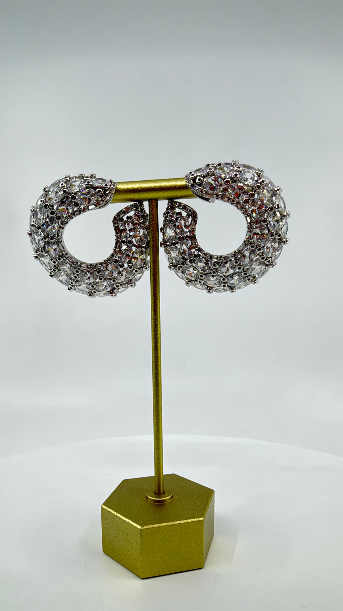 Celeste Pavé Crescent Hoop Earrings — on stand