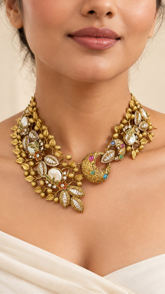 Model wearing the baroque pearl leaf necklace set, close-up