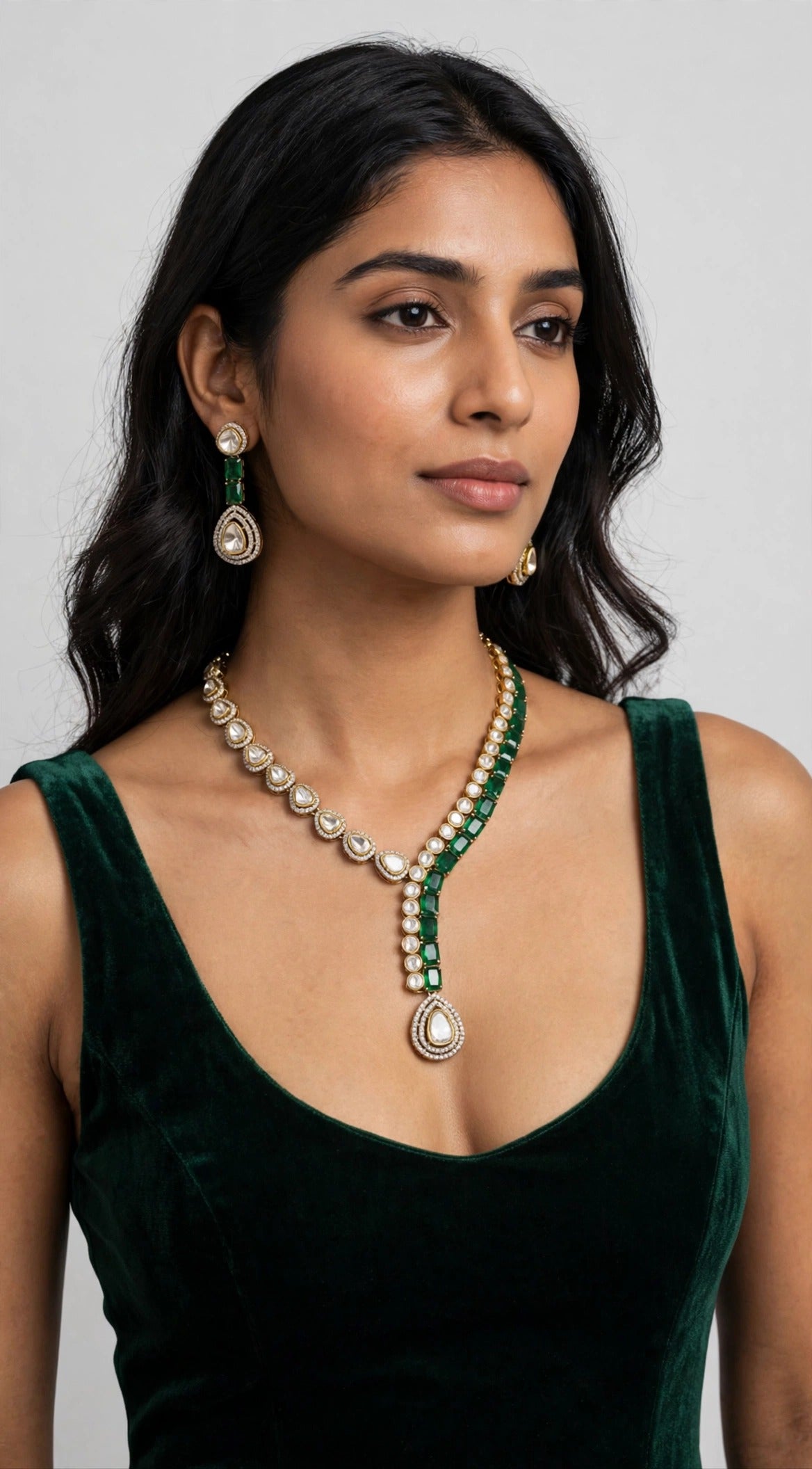 Emerald Polki Y-Neck Set worn on model in green velvet