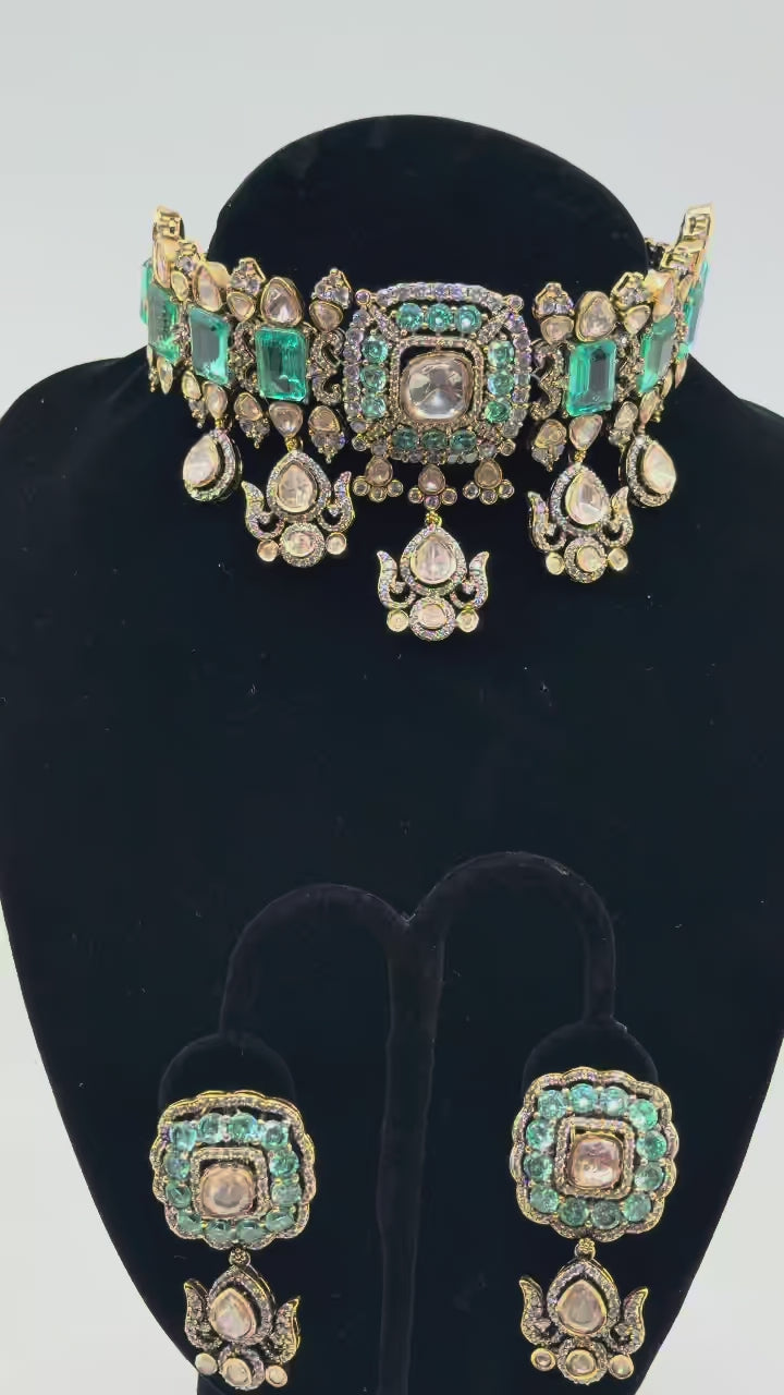 Aqua Polki Choker Set rotating on turntable