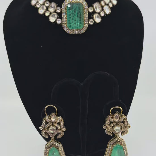 Mint Rectangle Polki Choker Set rotating on turntable