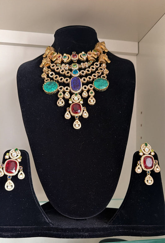 Regal Gemstone Set necklace and earrings on display bust