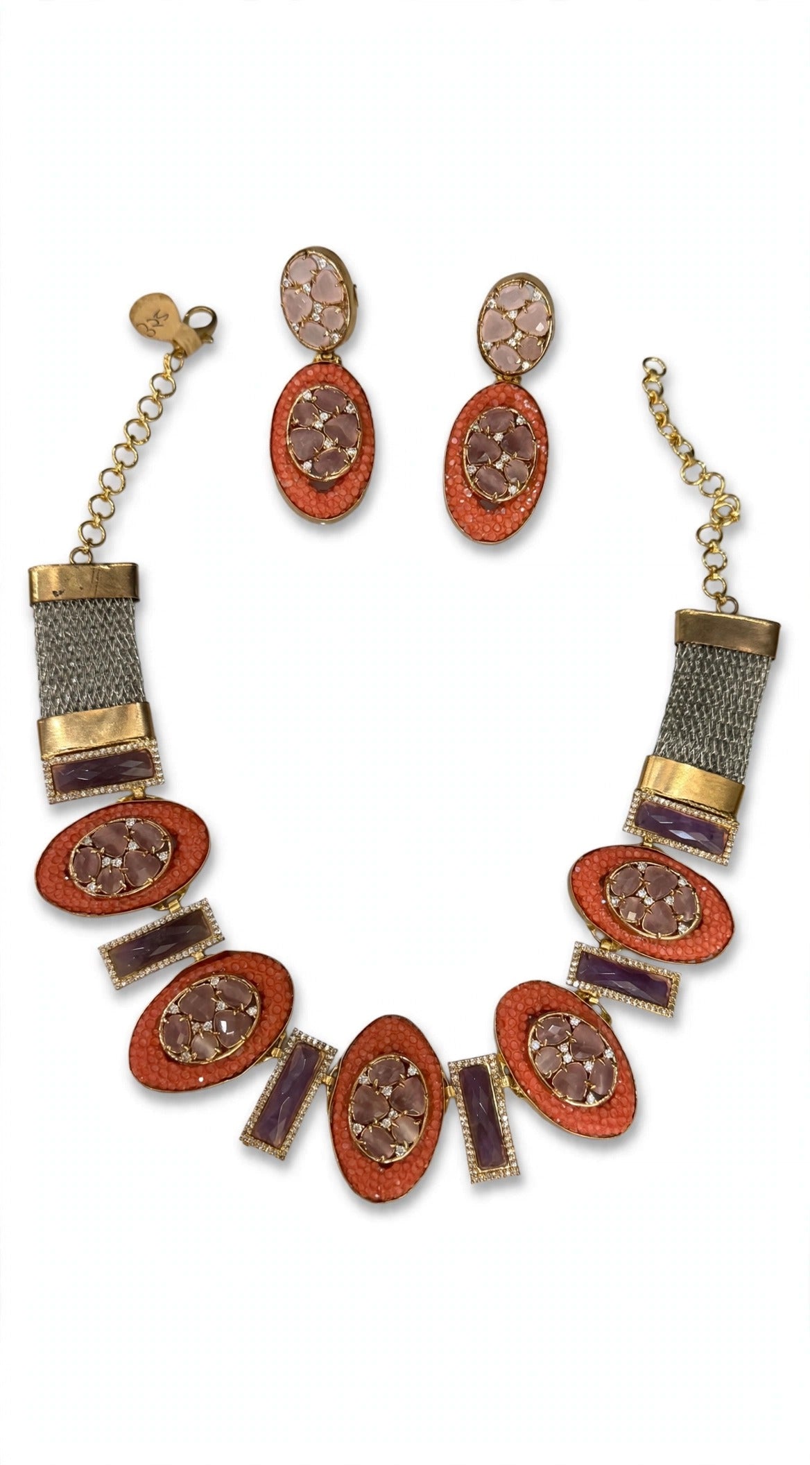 Coral blush oval necklace and matching earrings on a white background